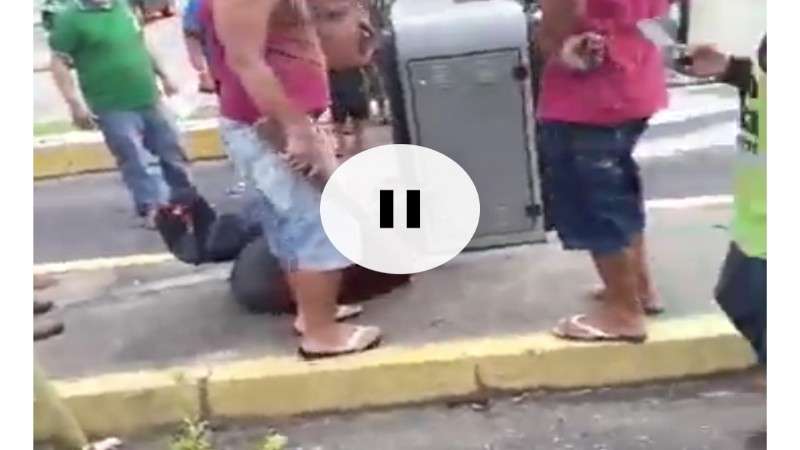 video mostra assaltante sendo espancado por populares depois de flagrante veja